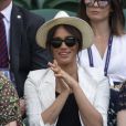 Meghan Markle, duchesse de Sussex, assiste au match "Serena Williams vs Kaja Juvan (2/6 - 6/2 - 6/4)" au Tournoi de Wimbledon 2019, le 4 juillet 2019.