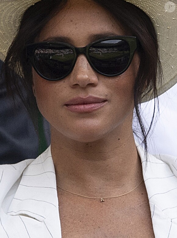 Meghan Markle, duchesse de Sussex, assiste au match "Serena Williams vs Kaja Juvan (2/6 - 6/2 - 6/4)" au Tournoi de Wimbledon 2019, le 4 juillet 2019.