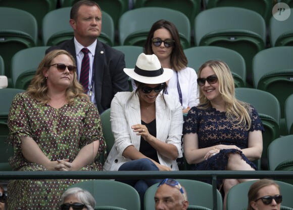 Meghan Markle, duchesse de Sussex, assiste au match "Serena Williams vs Kaja Juvan (2/6 - 6/2 - 6/4)" au Tournoi de Wimbledon 2019, le 4 juillet 2019.