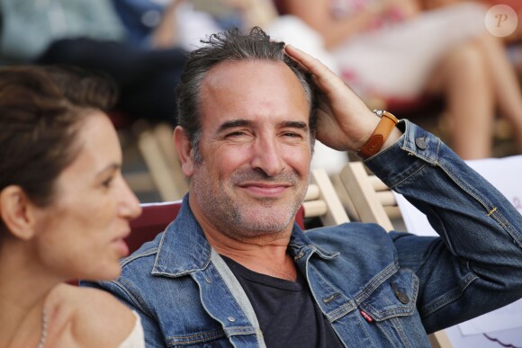 Jean Dujardin à la projection du film "OSS 177: Le Caire Nid d'Espions" lors de l'évènement "Un Dimanche Au Cinema" sur l'Avenue des Champs-Elysées à Paris, France, le 7 juillet 2019. 1750 personnes ont été sélectionnées pour assister gratuitement, à la projection du film sur l'Avenue des Champs-Elysées. Le CNC, le centre national du cinéma organise cette projection en plein air qui, pour la deuxième année consécutive, pour clore la Fête du Cinéma. © Stephen Caillet/Panoramic/Bestimage