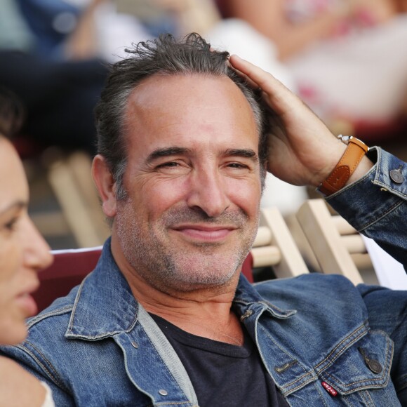 Jean Dujardin à la projection du film "OSS 177: Le Caire Nid d'Espions" lors de l'évènement "Un Dimanche Au Cinema" sur l'Avenue des Champs-Elysées à Paris, France, le 7 juillet 2019. 1750 personnes ont été sélectionnées pour assister gratuitement, à la projection du film sur l'Avenue des Champs-Elysées. Le CNC, le centre national du cinéma organise cette projection en plein air qui, pour la deuxième année consécutive, pour clore la Fête du Cinéma. © Stephen Caillet/Panoramic/Bestimage