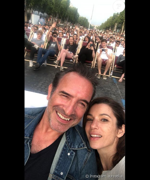 Aure Atika et Jean Dujardin sur les Champs pour la projection de "OSS 117 : Le Caire, nid d'espions", le 7 juillet 2019.