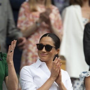 Catherine (Kate) Middleton, duchesse de Cambridge, Meghan Markle, duchesse de Sussex, et Pippa Middleton dans les tribunes lors de la finale femme de Wimbledon "Serena Williams - Simona Halep (2/6 - 2/6) à Londres, le 13 juillet 2019.