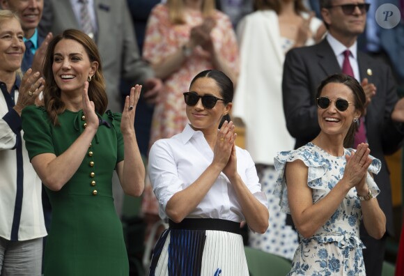 Catherine (Kate) Middleton, duchesse de Cambridge, Meghan Markle, duchesse de Sussex, et Pippa Middleton dans les tribunes lors de la finale femme de Wimbledon "Serena Williams - Simona Halep (2/6 - 2/6) à Londres, le 13 juillet 2019.