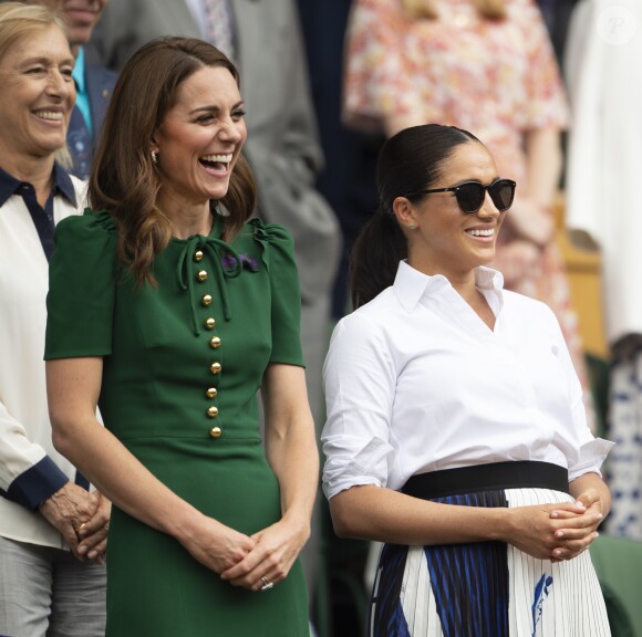 Catherine (Kate) Middleton, duchesse de Cambridge, Meghan Markle, duchesse de Sussex, et Pippa Middleton dans les tribunes lors de la finale femme de Wimbledon "Serena Williams - Simona Halep (2/6 - 2/6) à Londres, le 13 juillet 2019.