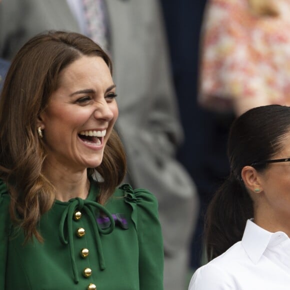 Catherine (Kate) Middleton, duchesse de Cambridge, Meghan Markle, duchesse de Sussex, et Pippa Middleton dans les tribunes lors de la finale femme de Wimbledon "Serena Williams - Simona Halep (2/6 - 2/6) à Londres, le 13 juillet 2019.