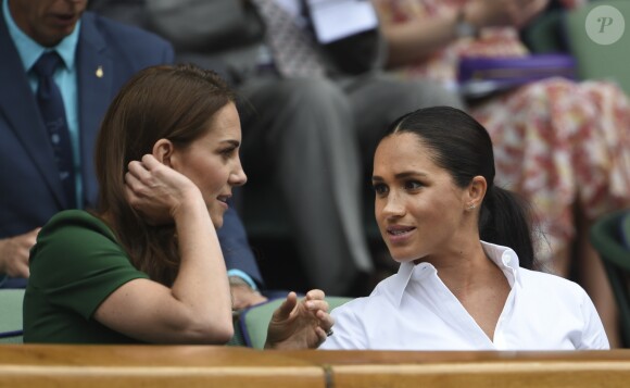 Catherine (Kate) Middleton, duchesse de Cambridge, Meghan Markle, duchesse de Sussex, et Pippa Middleton dans les tribunes lors de la finale femme de Wimbledon "Serena Williams - Simona Halep (2/6 - 2/6) à Londres, le 13 juillet 2019.