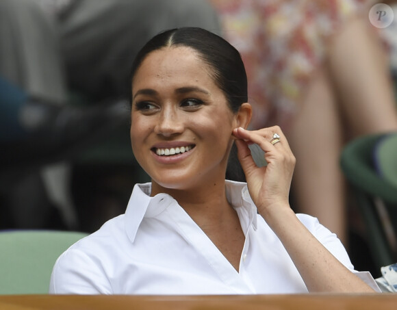 Catherine (Kate) Middleton, duchesse de Cambridge, Meghan Markle, duchesse de Sussex, et Pippa Middleton dans les tribunes lors de la finale femme de Wimbledon "Serena Williams - Simona Halep (2/6 - 2/6) à Londres, le 13 juillet 2019.