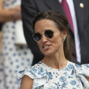 Catherine (Kate) Middleton, duchesse de Cambridge, Meghan Markle, duchesse de Sussex, et Pippa Middleton dans les tribunes lors de la finale femme de Wimbledon "Serena Williams - Simona Halep (2/6 - 2/6) à Londres, le 13 juillet 2019.