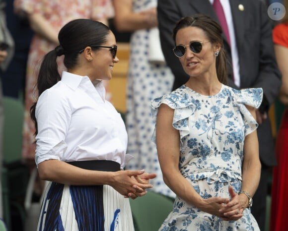 Catherine (Kate) Middleton, duchesse de Cambridge, Meghan Markle, duchesse de Sussex, et Pippa Middleton dans les tribunes lors de la finale femme de Wimbledon "Serena Williams - Simona Halep (2/6 - 2/6) à Londres, le 13 juillet 2019.