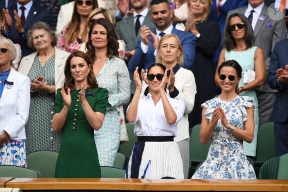 Catherine (Kate) Middleton, duchesse de Cambridge, Meghan Markle, duchesse de Sussex, et Pippa Middleton dans les tribunes lors de la finale femme de Wimbledon "Serena Williams - Simona Halep (2/6 - 2/6) à Londres, le 13 juillet 2019.