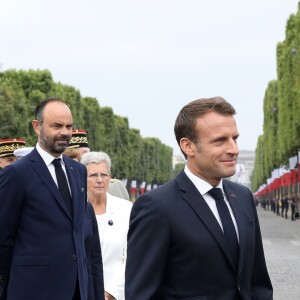 Geneviève Darrieussecq, secrétaire d'Etat, chargée du secrétariat d'État auprès de la ministre des Armées, Edouard Philippe, Premier ministre, Emmanuel Macron, président de la République Française, lors du 139ème défilé militaire du 14 juillet sur les Champs-Elysées, jour de la Fête Nationale. Paris, le 14 juillet 2019. © Stéphane Lemouton/Bestimage