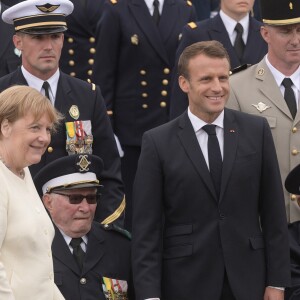 Emmanuel Macron, président de la République Française, Angela Merkel (chancelière d'Allemagne), lors du 139ème défilé militaire du 14 Juillet sur les Champs-Elysées, le jour de la Fête Nationale. Paris, le 14 juillet 2019. © Lemouton-Gorassini-Perusseau/Bestimage