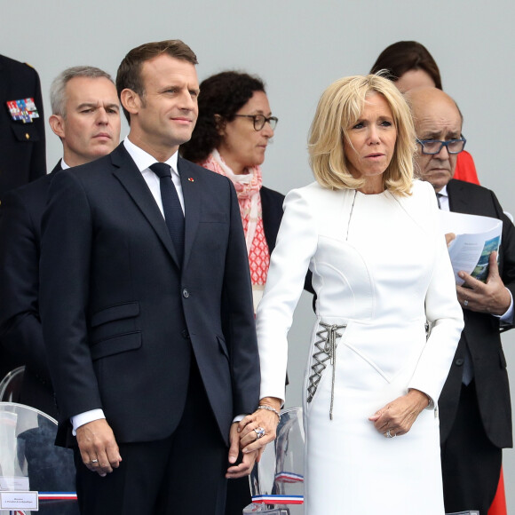 Emmanuel Macron, président de la République Française, et la Première dame Brigitte Macron lors du 139ème défilé militaire du 14 juillet sur les Champs-Elysées, jour de la Fête Nationale. Paris, le 14 juillet 2019. © Lemouton-Gorassini-Perusseau/Bestimage2019.14/07/2019 - Paris
