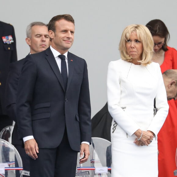 Emmanuel Macron, président de la République Française, et la Première dame Brigitte Macron lors du 139ème défilé militaire du 14 juillet sur les Champs-Elysées, jour de la Fête Nationale. Paris, le 14 juillet 2019. © Lemouton-Gorassini-Perusseau/Bestimage