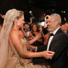 Elie Saab et sa belle-fille Christina Mourad lors du mariage d'Elie Saab Jr et Christina à Faqra. Le 19 juillet 2019.
