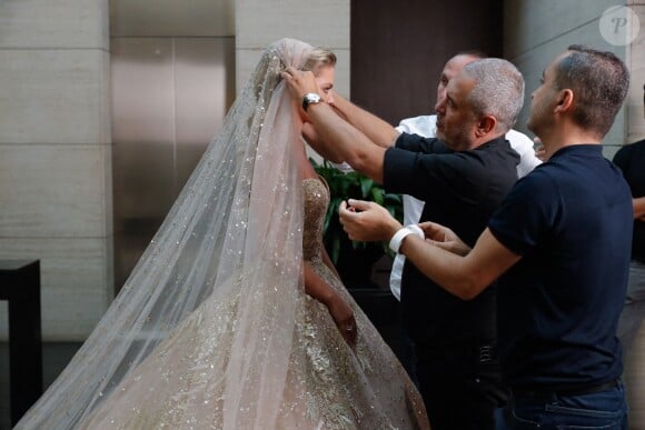 Le grand couturier Elie Saab habille sa belle-fille Christina Mourad pour son mariage à Elie Saab Jr. Faqra, le 19 juillet 2019.