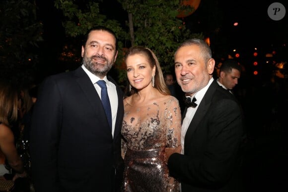 Le Premier Ministre du Liban, Saad Hariri, Elie Saab et son épouse Claudine (au milieu) assistent au mariage d'Elie Saab Jr et Christina Mourad à Faqra. Le 19 juillet 2019.
