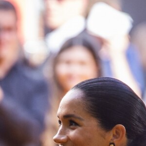 Meghan Markle, duchesse de Sussex, avec le prince Harry lors de la première du film Le Roi Lion au cinéma Odeon Luxe Leicester Square à Londres, le 14 juillet 2019.