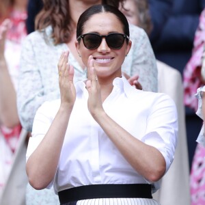 La duchesse Catherine de Cambridge et la duchesse Meghan de Sussex à Wimbledon le 13 juillet 2019.