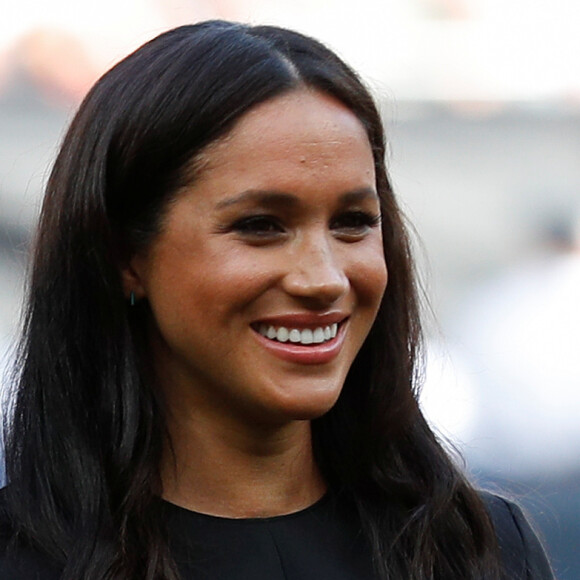 Meghan Markle, duchesse de Sussex allant saluer les équipes de baseball des Boston Red Sox et des New York Yankees dans leurs vestiaires dans le cadre des Invictus Games 2019 à Londres, le 29 juin 2019.