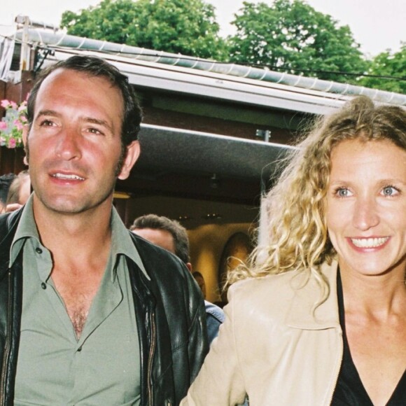 Jean Dujardin, Alexandra Lamy, Aure Atika et Marion Cotillard à Roland Garros, en 2004. 