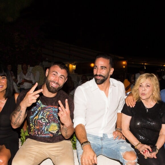 Bettina (propriétaire), Yohan Lidon (kickboxeur), Adil Rami, Nicoletta, Bernard Montiel, Jocelyn et Jean-Christophe Molinier assistent à la soirée des 50 ans de l'hôtel le Mas de Bellevue à Saint-Tropez, Côte d'Azur, France, le 8 août 2019. © Jack Tribeca/Bestimage