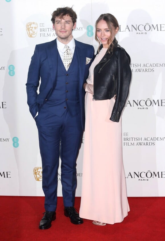 Sam Claflin et sa femme Laura Haddock - Photocall de la soirée "Pre BAFTA Lancôme" à Londres. Le 13 février 2016.
