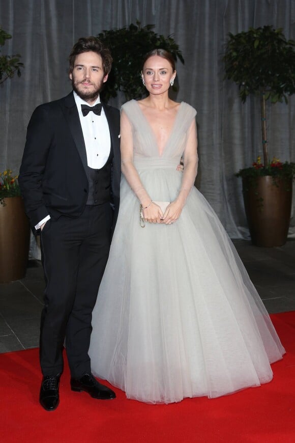 Sam Claflin et sa femme Laura Haddock arrivant à l'after-party officielle des "British Academy of Film and Television Arts" (BAFTA) 2015 à Londres, le 8 février 2015.