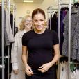 Meghan Markle (enceinte), duchesse de Sussex, en visite dans les locaux de l'association "Smart Works" à Londres. Le 10 janvier 2019  The Duchess of Sussex, walks through racks of clothes with Lady Juliet Hughes-Hallett, during her visit to Smart Works, in London, on the day that she has become their patron, as well as patron of the National Theatre, the Association of Commonwealth Universities, and the animal welfare charity, Mayhew.10/01/2019 - Londres