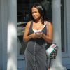 Exclusif - Christina Milian, enceinte, à la sortie du salon de coiffure "Drybar" à Los Angeles, le 22 août 2019.