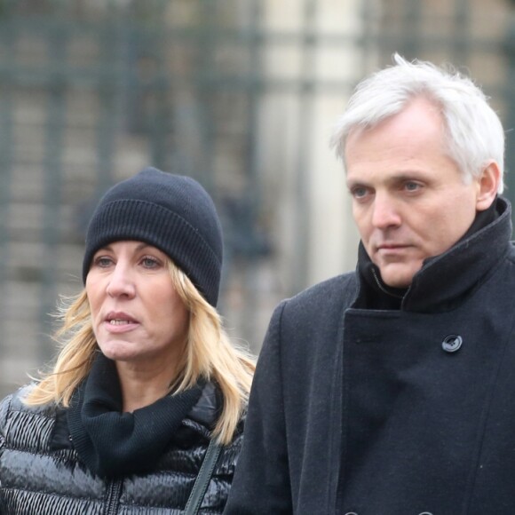 Mathilde Seigner et son compagnon MAthieu Petit - Sorties de l'église de la Madeleine après les obsèques de Johnny Hallyday à Paris - Le 9 décembre 2017