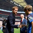 Le prince Harry, duc de Sussex, lors du match de finale de la Rugby League Challenge Cup à Londres le 24 août 2019.