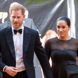 Le prince Harry, duc de Sussex, et Meghan Markle, duchesse de Sussex, à la première du film "Le Roi Lion" au cinéma Odeon Luxe Leicester Square à Londres, le 14 juillet 2019.