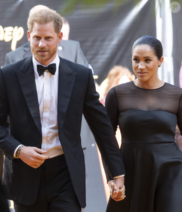 Le prince Harry, duc de Sussex, et Meghan Markle, duchesse de Sussex, à la première du film "Le Roi Lion" au cinéma Odeon Luxe Leicester Square à Londres, le 14 juillet 2019.