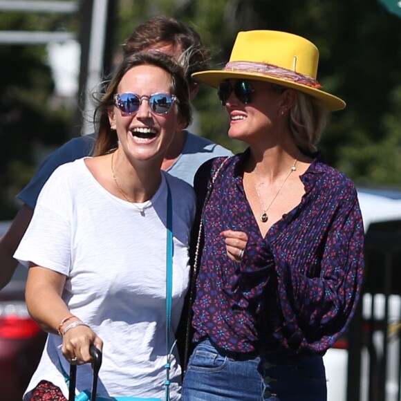 Laeticia Hallyday et son compagnon Pascal Balland avec Marine, l'ex-femme de Pascal Balland, à Los Angeles, avant d'aller chercher leurs filles à l'école. Le 13 septembre 2019