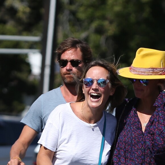 Laeticia Hallyday et son compagnon Pascal Balland avec Marine, l'ex-femme de Pascal Balland, à Los Angeles, avant d'aller chercher leurs filles à l'école. Le 13 septembre 2019