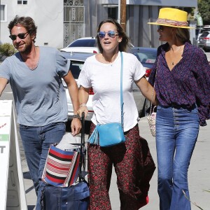 Laeticia Hallyday et son compagnon Pascal Balland avec Marine, l'ex-femme de Pascal Balland, à Los Angeles, avant d'aller chercher leurs filles à l'école. Le 13 septembre 2019