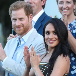 Le prince Harry, duc de Sussex, et Meghan Markle, duchesse de Sussex, lors d'une réception dans les jardins de la résidence du haut-commissaire britannique au Cap, Afrique du Sud, le 24 septembre 2019.  Britain's Prince Harry and Meghan, The Duchess of Sussex, attend a traditional garden reception where they will meet a cross-section of inspiring opinion-formers, young future leaders and other community and industry leaders that demonstrate the UK's modern partnership with South Africa.24/09/2019 - Le Cap