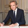 Bernard Arnault, PDG de LVMH signe avec l'archevêque de Paris, Mgr Michel Aupetit, à la résidence de l'archevêque, la convention officialisant la promesse de 200 millions d'euros de dons faite au nom de la famille Arnault et de son groupe de Luxe LVMH pour la restauration de Notre-Dame de Paris le 24 Septembre 2019. © Guirec Coadic / Bestimage