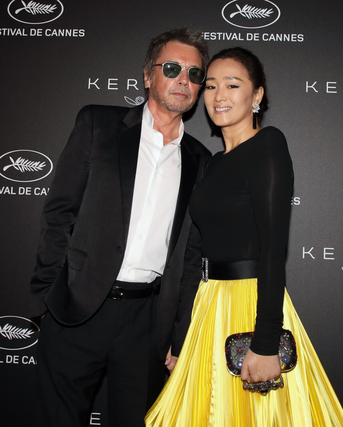 Photo : Jean-Michel Jarre et sa compagne Gong Li - Photocall de la soirée  Kering 