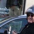 Exclusif - Gérard Depardieu quitte la station de radio RTL en scooter à Paris le 7 mars 2019.