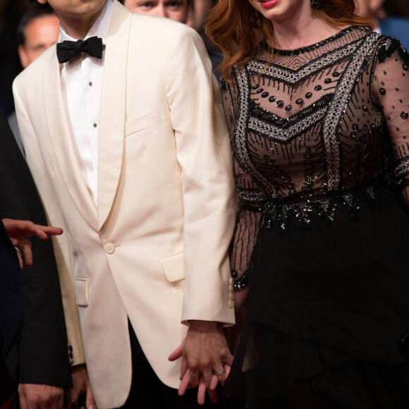 Geoffrey Arend et Christina Hendricks - Montée des marches du film "Coming Home" lors du 67e Festival du film de Cannes.