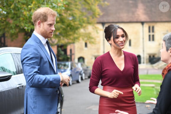 Meghan Markle, duchesse de Sussex, et le prince Harry participaient à une réunion sur l'égalité des genres avec les membres du Queen's Commonwealth Trust (dont elle est vice-présidente) et du sommet One Young World au château de Windsor, le 25 octobre 2019.