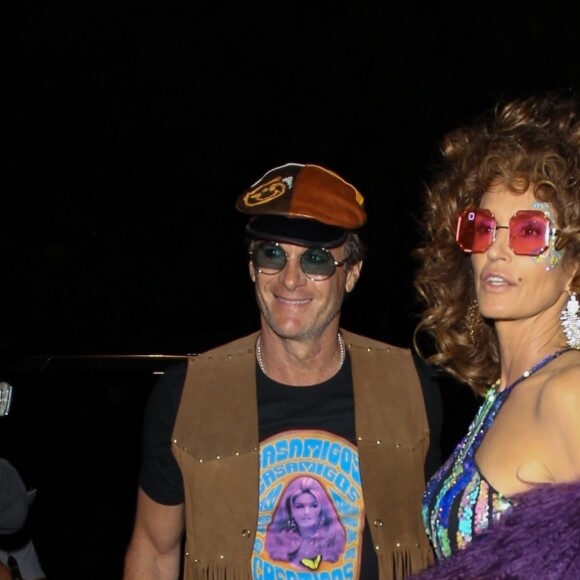 Cindy Crawford et son mari Rande Gerber assistent à la soirée d'Halloween de la marque de tequila Casamigos dans le quartier de Beverly Hills à Los Angeles, le 25 octobre 2019.
