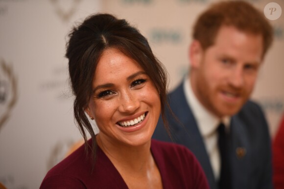 Le prince Harry et Meghan Markle, duchesse de Sussex, participent à une réunion sur l'égalité des genres avec les membres du Queen's Commonwealth Trust (dont elle est vice-présidente) et du sommet One Young World au château de Windsor, le 25 octobre 2019.