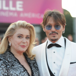 Catherine Deneuve et Johnny Depp à la première du film "Waiting For The Barbarians" lors du 45éme festival du Cinéma Américain de Deauville, France, le 8 septembre 2019.