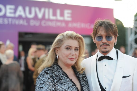 Catherine Deneuve et Johnny Depp à la première du film "Waiting For The Barbarians" lors du 45éme festival du Cinéma Américain de Deauville, France, le 8 septembre 2019.