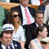 Hugh Grant et sa femme Anna Elisabet Eberstein - Les célébrités dans les tribunes de Wimbledon à Londres, le 12 juillet 2019.
