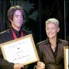 Marie Fredriksson et Per Gessle reçoivent un prix lors des BMI Awards pour leur chanson "It Must Have Been Love". Londres. Le 29 novembre 2005.